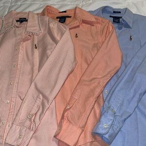 Three Ralph Lauren Button Up Shirts in Blue, Orange, and Pink Stripes